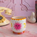 A Dopo 8 oz Handpainted Sun Ceramic Candle-  Orange Blossom