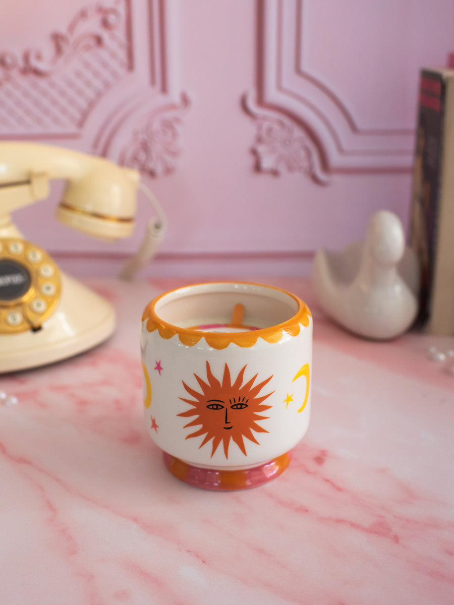 A Dopo 8 oz Handpainted Sun Ceramic Candle-  Orange Blossom